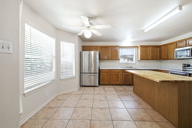 Building Photo - 4 Bedroom home with ZERO carpet close to RAFB