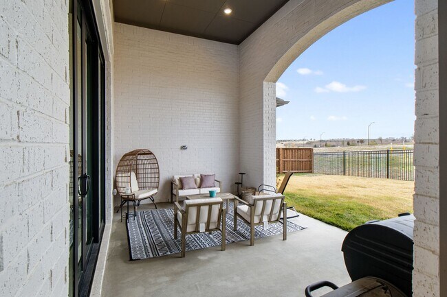 Building Photo - Stunning 4-Bedroom Luxury Residence with Bonus Office in the Prestigious Walsh Community LIKE NEW!