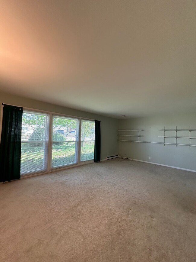 Building Photo - Not Your Typical Rental — Warm, Welcoming 3BR Brick Ranch in a Prime Neighborhood