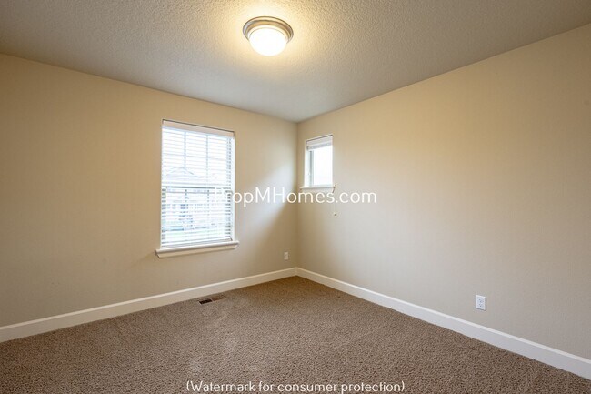 Building Photo - Beautiful Open Concept Four Bedroom Plus Office/Den in Villebois!