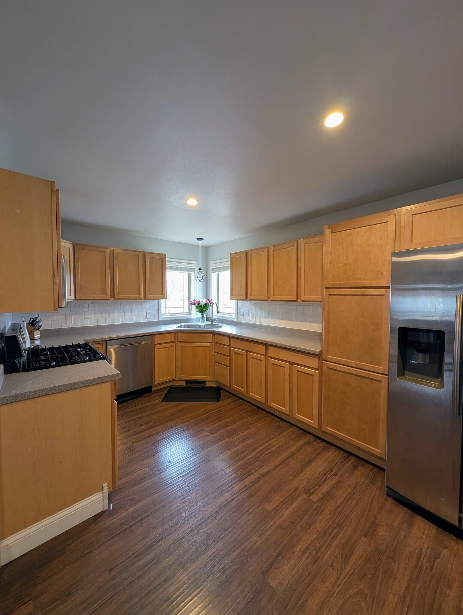 Open kitchen with lots of cabinets and steel appliances - 518 Lexington Dr