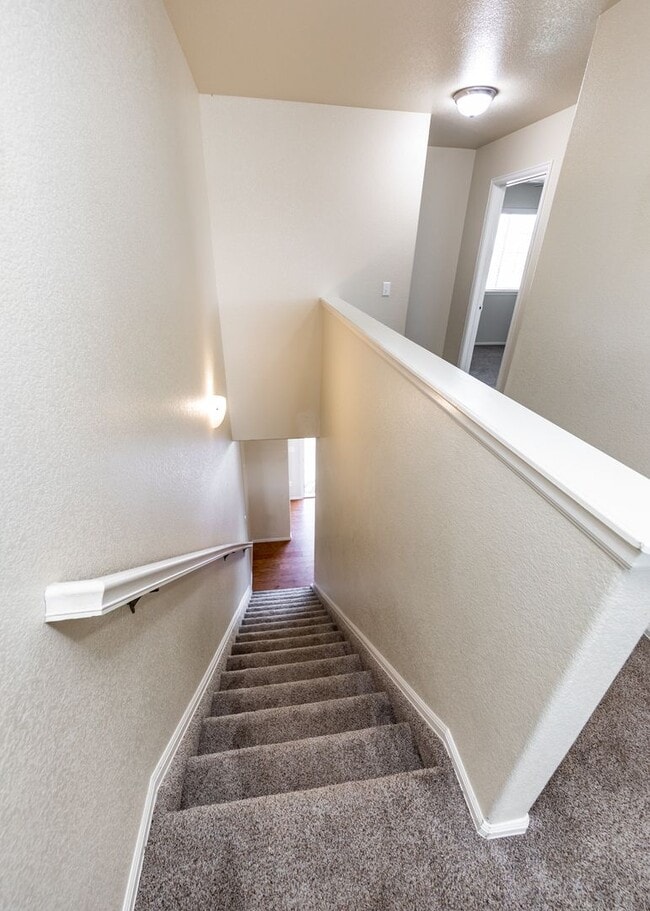 Building Photo - Cute End Unit 3 Bedroom Townhome in Lorson Ranch Next to Open Space