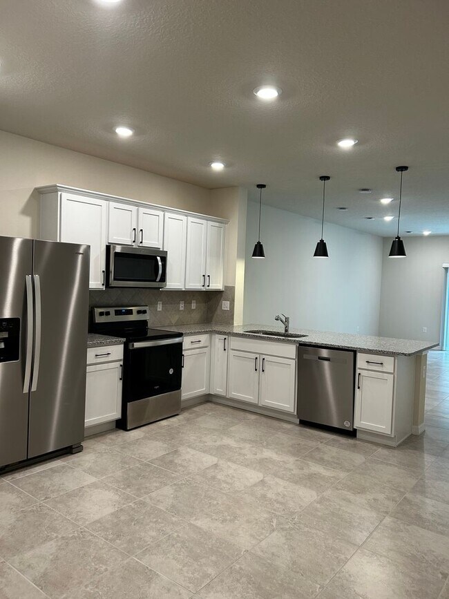 Building Photo - Move In ASAP!! - Brand New 3 bedroom 2.5 bath Townhouse for rent in Kissimmee, FL.