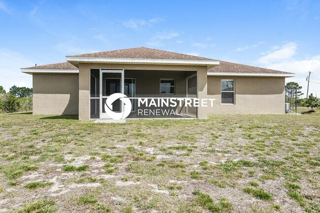Building Photo - 3 Bedroom Pet-Friendly Home in Lehigh Acres, FL with Main Street Renewal