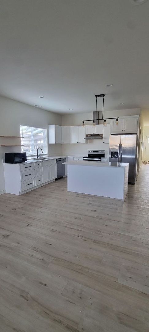 Building Photo - 4 Bedroom Home w/ Spacious Yard!