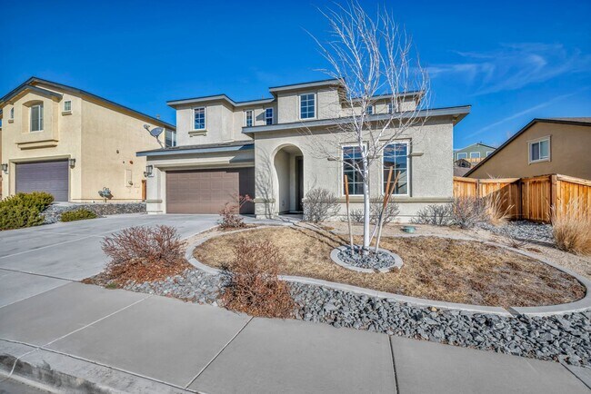 Building Photo - Sun-Filled, Spacious Living with a Three-Car Garage