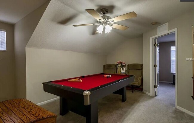 Building Photo - Charming 4-Bedroom Home with Pond Views & ...