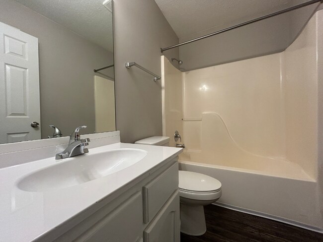 Building Photo - Spacious 3BR/2BA Lake Community Home | Soaring High Ceilings, Fireplace & 2-Car Garage