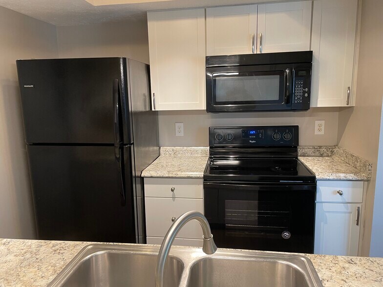 Kitchen view from the bar - 5042 Magnolia Blossom Blvd