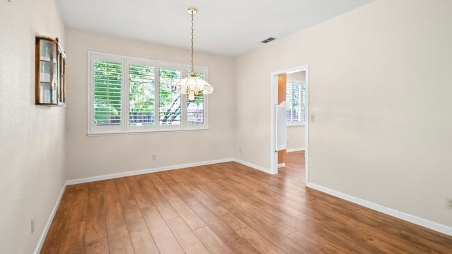 Building Photo - 4 BR/3BA Home in Laurel Creek with Park-Like Backyard!