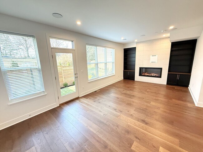 Building Photo - Brand new 4 level, 4 Bedroom Townhome with Elevator!