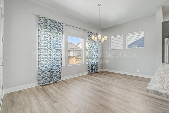 Building Photo - 21087 E 62nd Dr