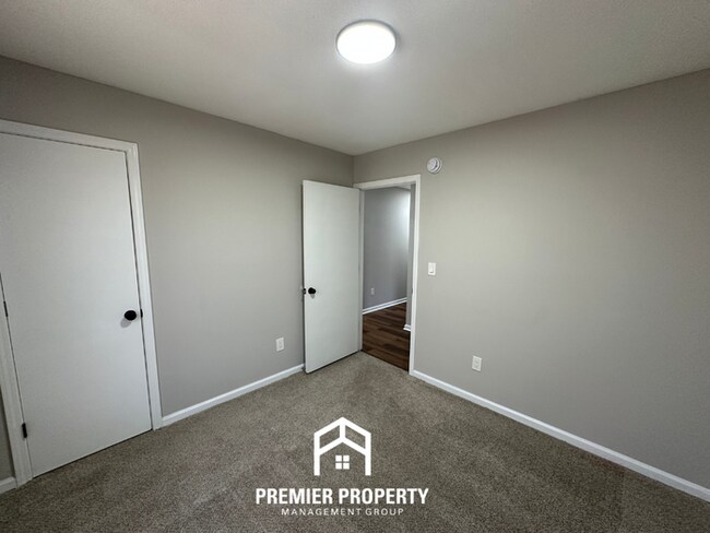 Building Photo - Spacious 4BR/2BA Home in 38141 | Vinyl Flooring & Large Fenced Backyard