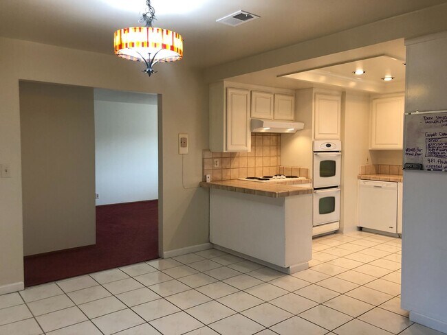 Building Photo - 4bd/2ba - Bedroom Home with a Lap Pool! Excellent Location - Coming Soon!