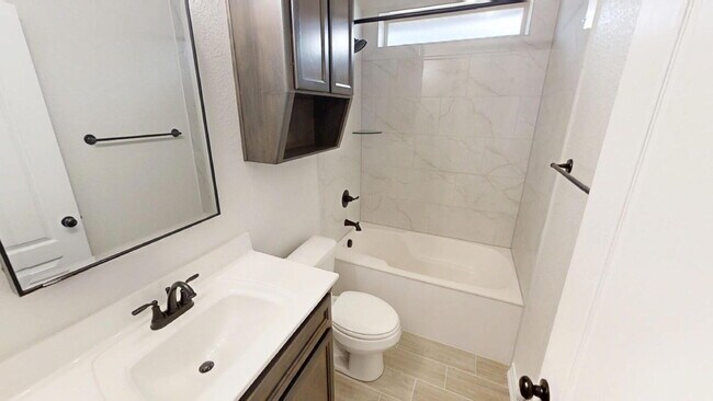 Building Photo - Welcome home to this beautifully designed 4-bedroom, 2.5-bathroom gem!