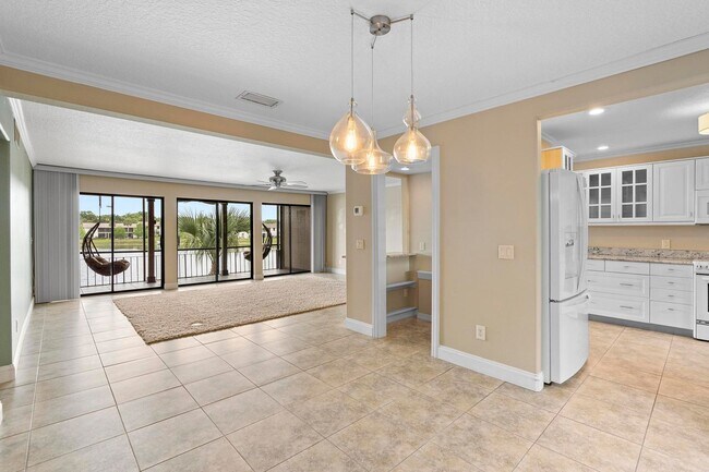 Building Photo - Lakefront lifestyle in this stunning 3-bed...