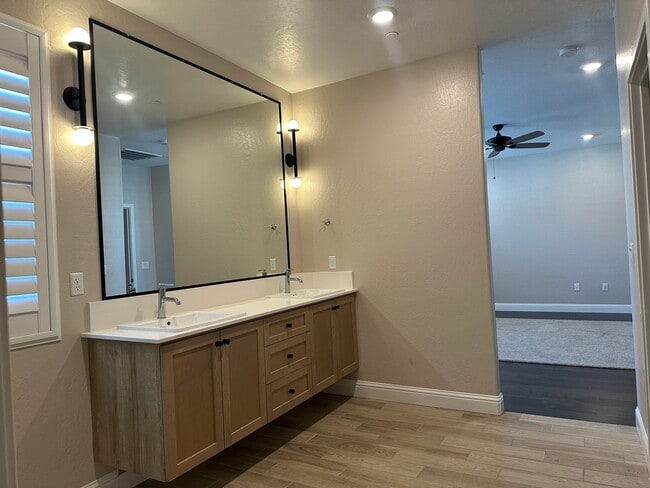 Building Photo - Modern home in a modern community featuring upgraded amities, solar, community pool + Close to Co...