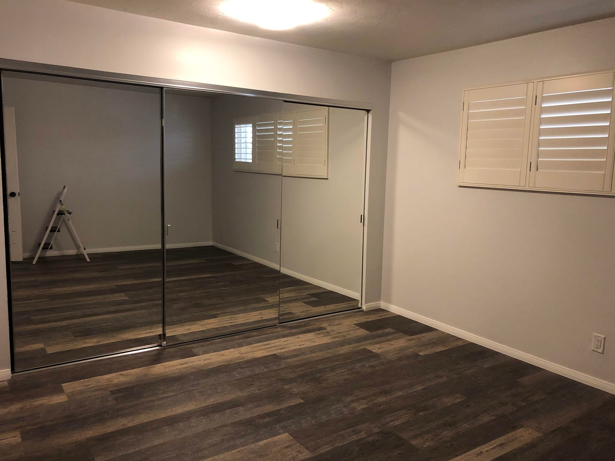 Large Bedroom with Mirrored Closet - 4045 E 3rd St