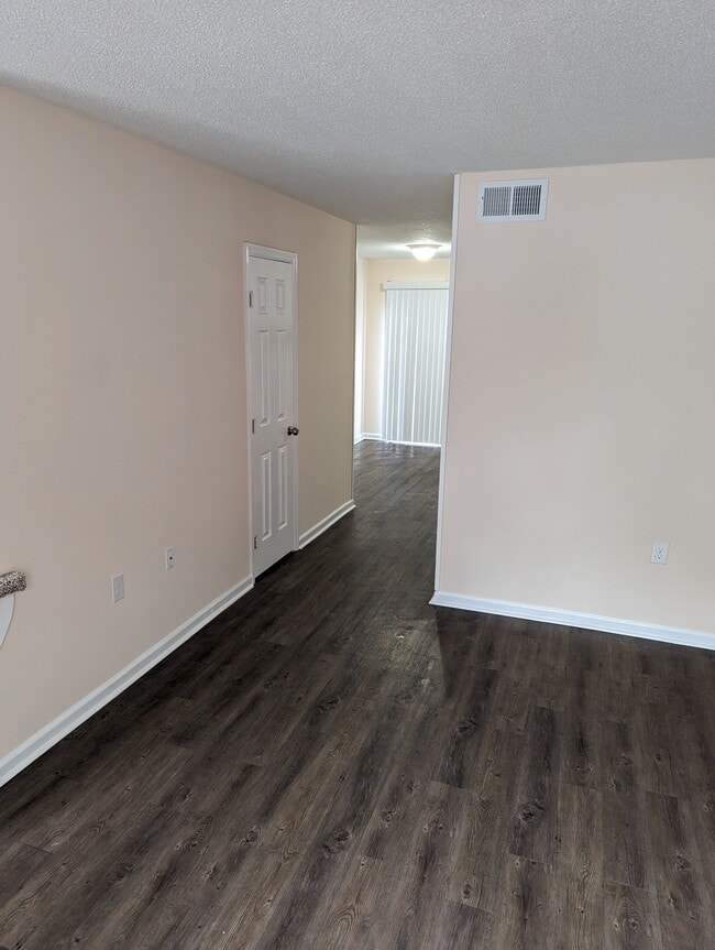View from living room to powder room & dining area - 251 Knight Dr