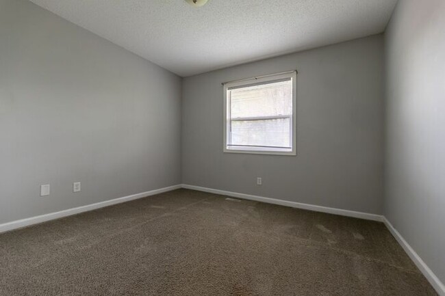 Building Photo - **Charming 3-Bedroom Home with Spacious Ya...