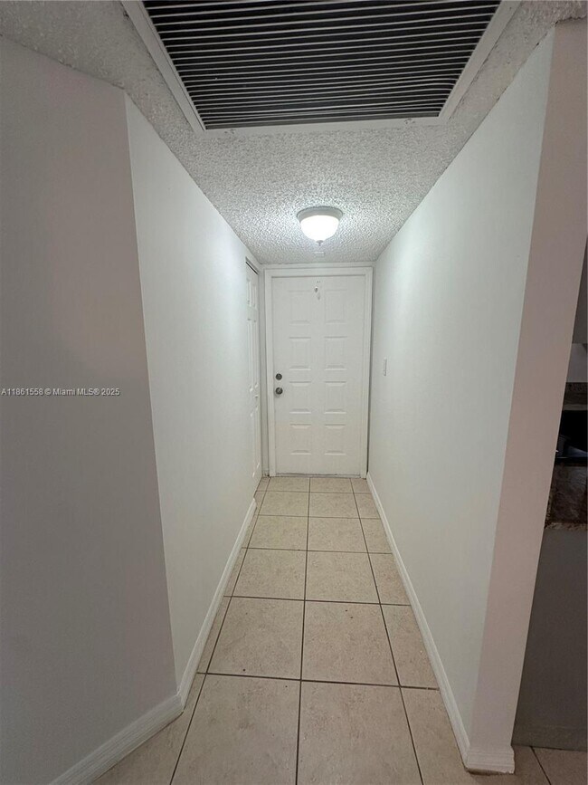 Building Photo - 11213 Royal Palm Blvd
