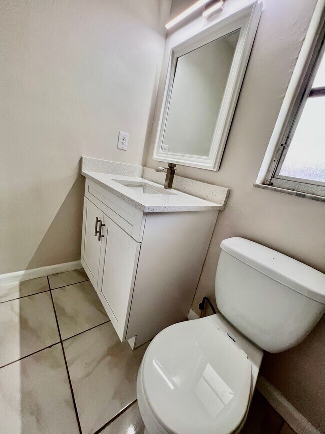 Building Photo - Live Comfortably in SE Cape Coral – Bright, Remodeled Home for Rent