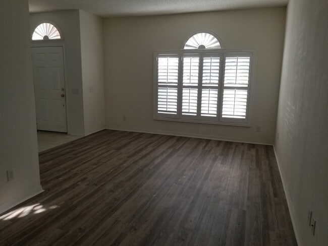 Building Photo - Lovely Four Bedroom with Pond View