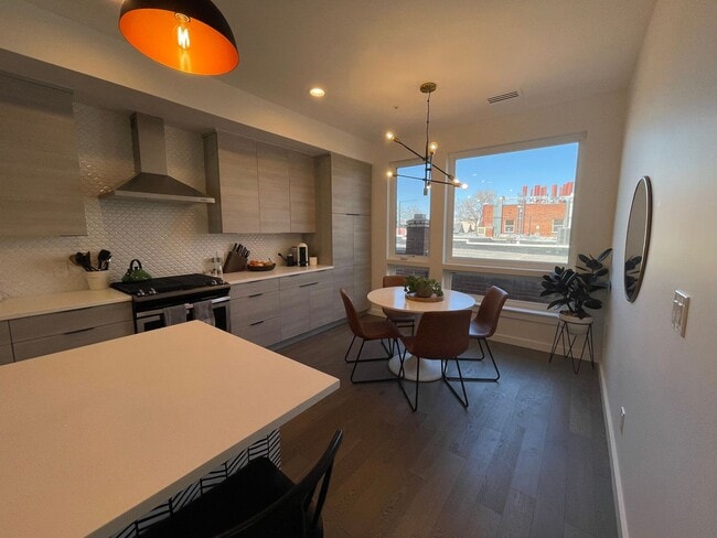 Building Photo - Modern 2BR + Office Townhome with Rooftop Deck in Prime Sunnyside/Highlands Location