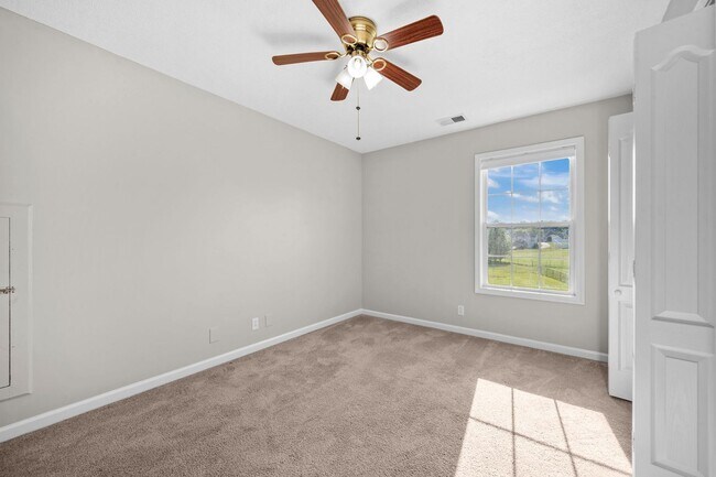 Building Photo - Charming Brick Home with Soaring Ceilings & Updated Finishes!