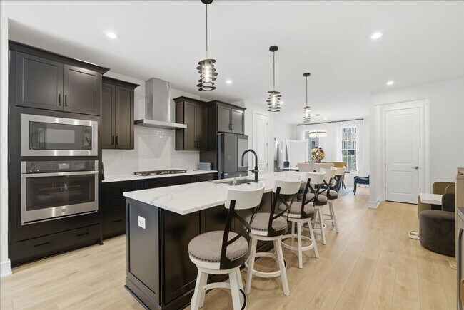 Building Photo - Welcome to this stunning, newly built 2025 townhome nestled in the heart of Brambleton