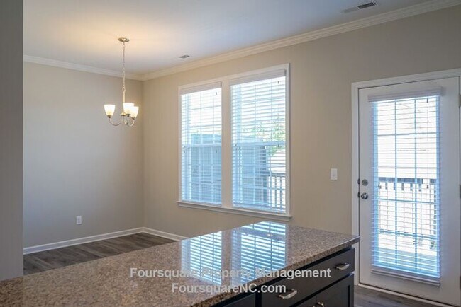 Building Photo - Modern 3-Story Townhome with Entry-Level Bonus Room, Back Deck & Garage , Community Pool in North...