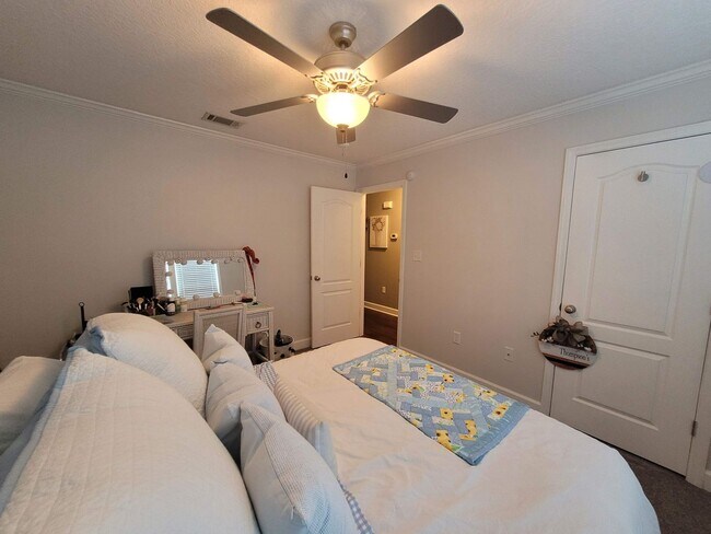 Building Photo - Exquisite Southern Living: 3BR/2BA Gem with Modern Touches, Fenced Yard, and Community Pool in Be...