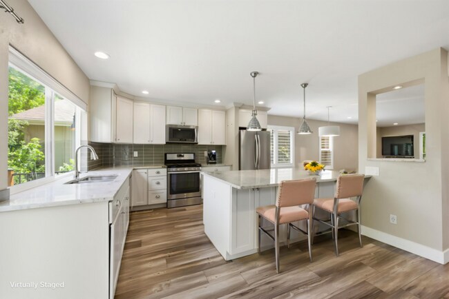 Building Photo - Spacious 4BR Home with Finished Basement, Private Yard & Community Amenities