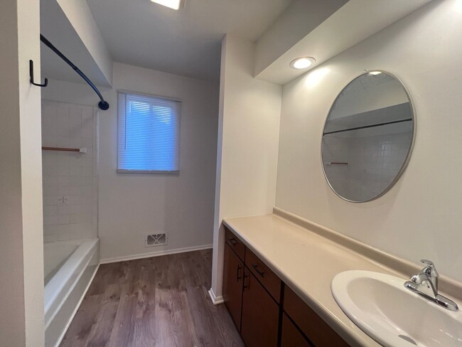 Building Photo - Two Bedroom Duplex SE Side w/ Decorative Fireplace! One Stall in Garage!