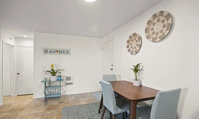 Building Photo - charming one-bedroom, one-bath retreat nestled in a serene beachside community