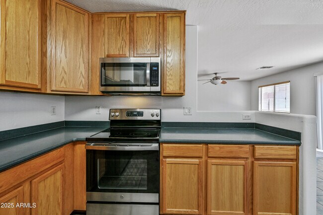 Building Photo - 12925 W Fleetwood Ln