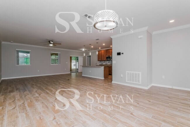 Building Photo - Feel welcome and comfortable in this charming home