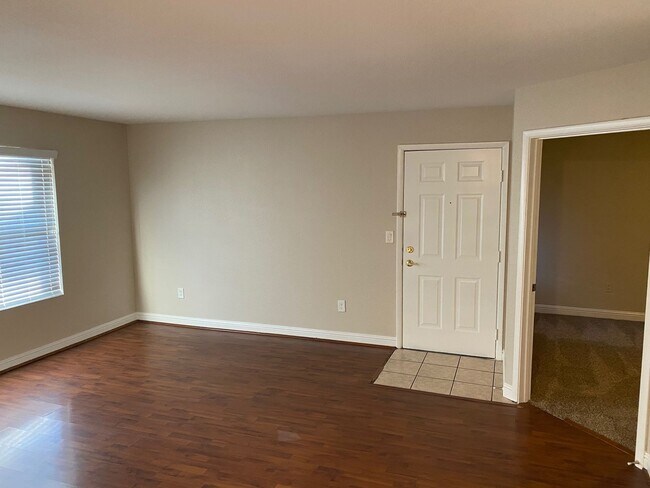 Building Photo - SW!! First floor unit with Balcony!! Gated!! Clubhouse!!  Community pool!! Spa!! Exercise Room!! ...