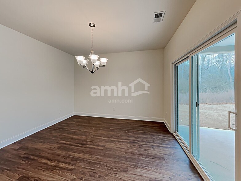 Building Photo - 7053 Creeksong Dr