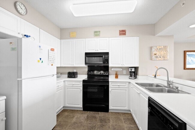 Building Photo - Spacious 3BR/3BA Coastal Retreat at Harbour Pointe – Utilities Included!