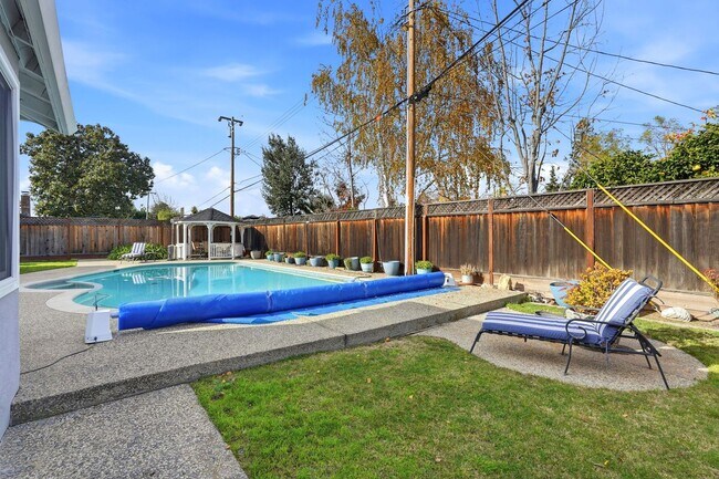 Building Photo - One-of-a-Kind Home with Pool, Gazebo, and Sunken Conversation Pit!