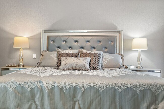 Building Photo - Two Bedroom/Two and a half bath gated townhome.