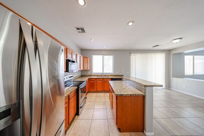 Building Photo - Welcome to this spacious 4 bedroom, 2.5 ba...