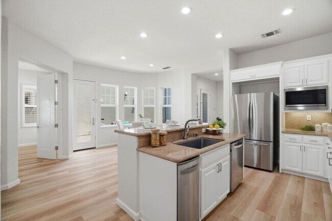 Building Photo - BRIGHT, OPEN RESIDENCE IN RIVERMARK HOME WITH EXCELLENT LAYOUT