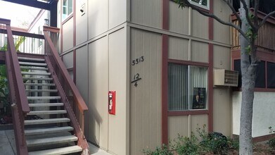 Building Photo - 3 bedroom, 2 bath, ground floor unit, and private patio.