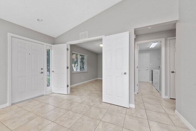 Building Photo - Deluxe Villa Lake view all Tile. 3 Bedrooms+2 Baths