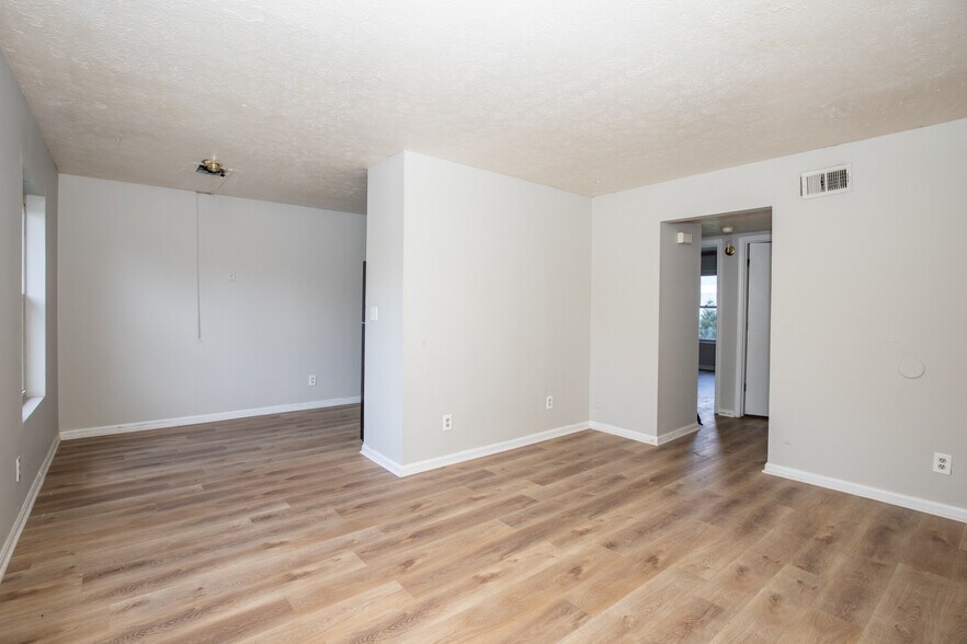 dining area + living room - 7417 Garrison Rd