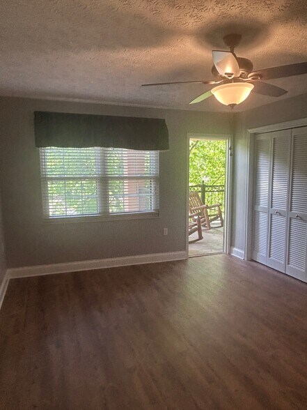 Primary with door open to balcony - 210 Roaring Fork Ext