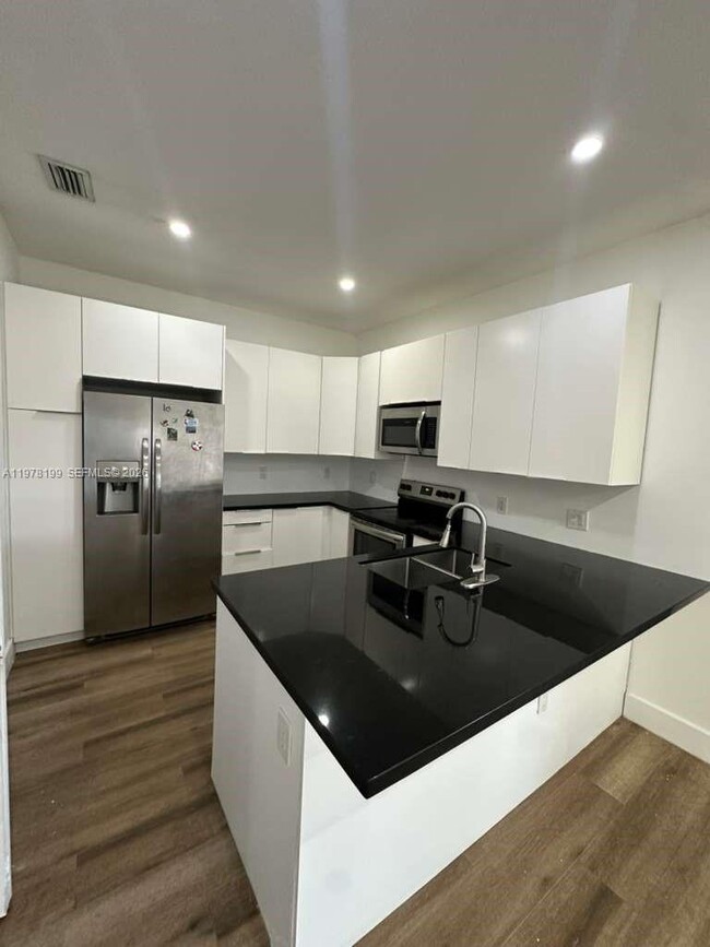 Building Photo - 9999 NW 23rd Ave