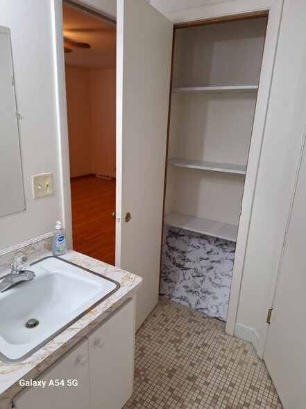 Main bathroom closet - 6405 Milwaukee Ave